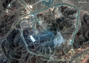 Maxar Technologies via AP : This satellite image provided by Maxar Technologies shows damage at the Fordo enrichment facility in Iran after U.S. strikes, Sunday, June 22, 2025