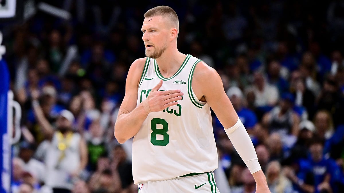 Kristaps Porzingis #8 of the Boston Celtics reacts in the first half during game 4 of the first round of the 2025 NBA Playoffs against the Orlando Magic at Kia Center on April 27, 2025 in Orlando, Florida.