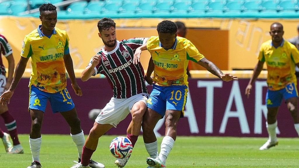 Photo: AP : Fluminense's Matheus Martinelli passes the ball in front of Mamelodi Sundowns' Jayden Adams during their FIFA Club World Cup Group F match in Miami Gardens.