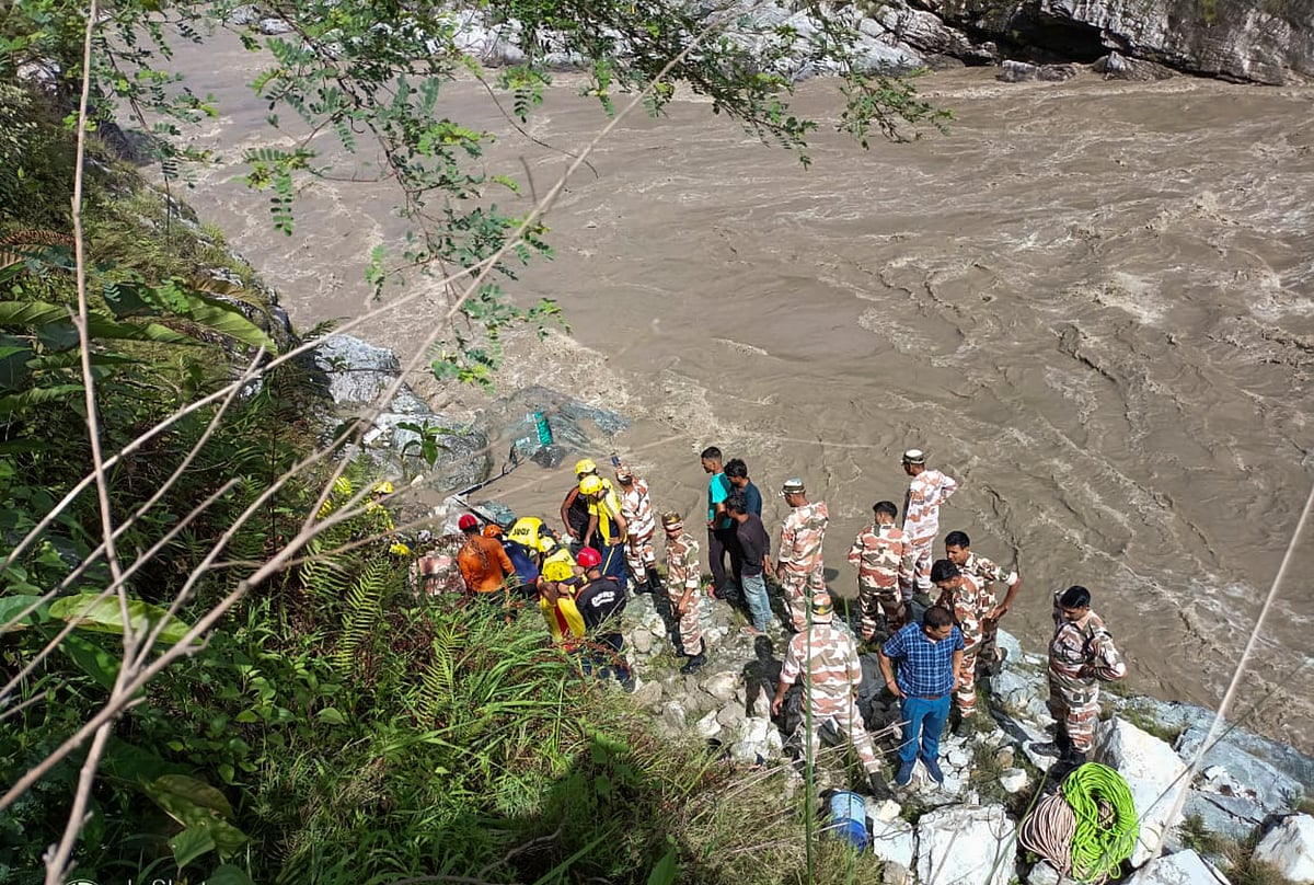 PTI Photo  : Rescue operation underway after a tempo traveller carrying pilgrims fell into the Alaknanda River, in Rudraprayag district, Uttarakhand, Thursday, June 26, 2025. 