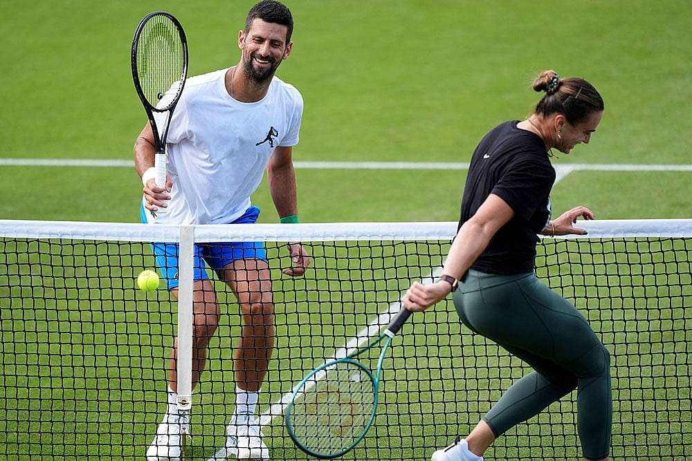 | Photo: Ben Whitley/PA via AP : Britain Tennis Wimbledon practice session