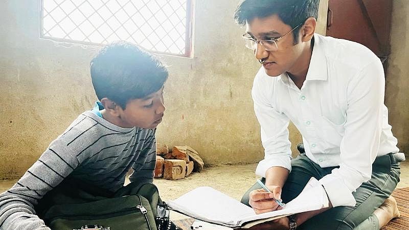 Vipul Jain with a student - null