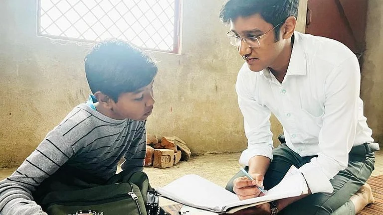 Vipul Jain with a student - null