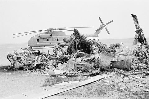 Remains of a burned-out U.S. helicopter
