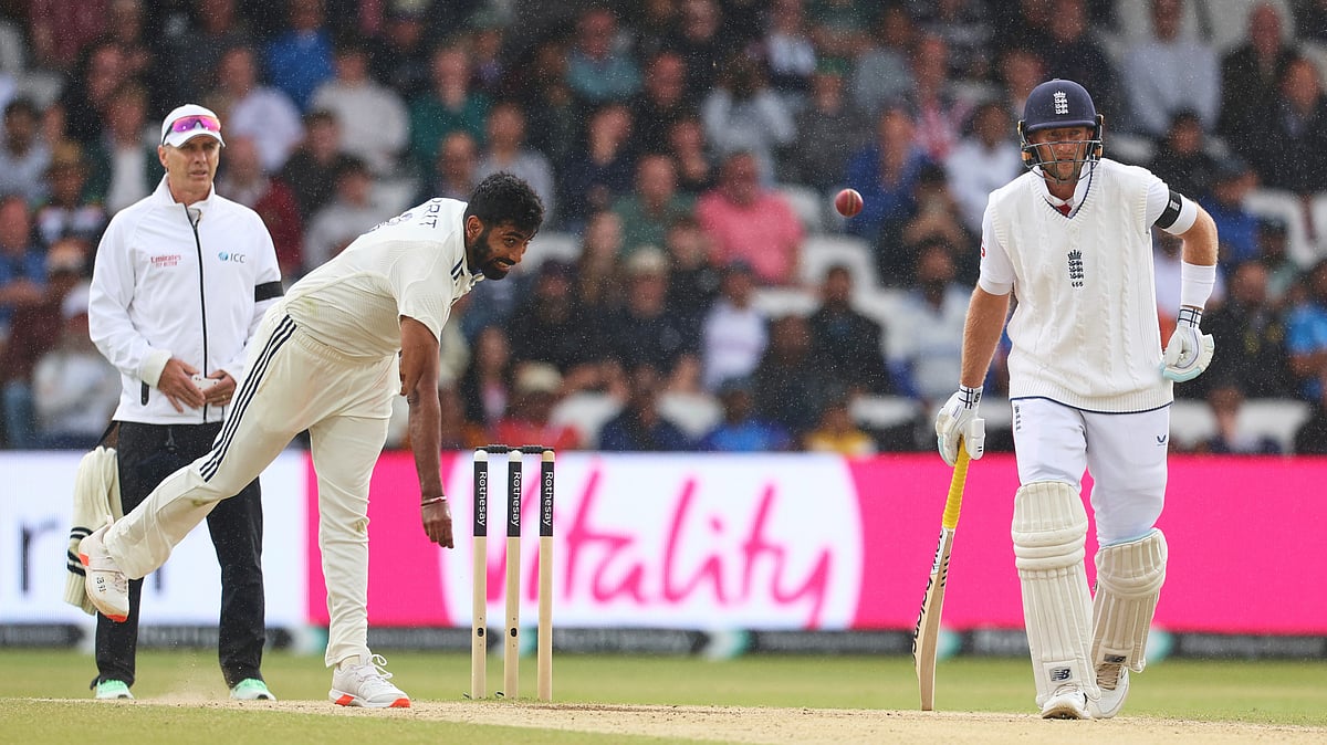AP Photo/Scott Heppell : India's Jasprit Bumrah, left, bowls a delivery on day five of the first cricket test match between England and India at Headingley in Leeds, England.