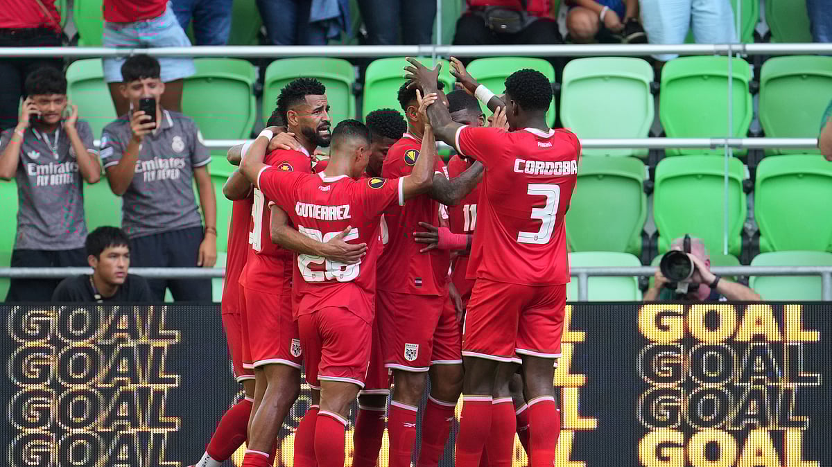 AP Photo/Eric Gay : Panama's Ismael Diaz, centre, celebrates with teammates after his goal against Jamaica during a CONCACAF Gold Cup football match.