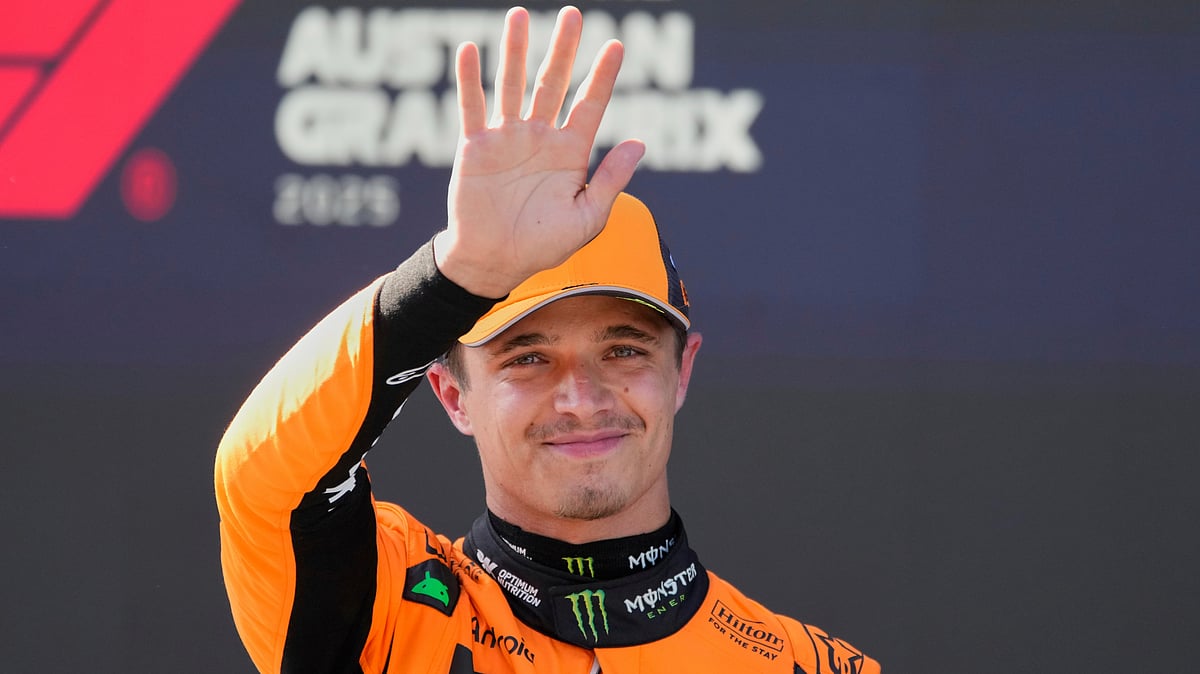  (AP Photo/Darko Bandic) : McLaren driver Lando Norris of Britain reacts after winning the pole position at the qualifying at the Red Bull Ring racetrack, ahead of the Austrian Formula One Grand Prix in Spielberg, Austria, Saturday, June 28, 2025.