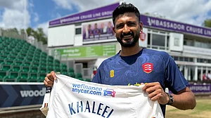 X/Essex Cricket : Khaleel Ahmed poses with his Essex jersey after signing on for the County club.