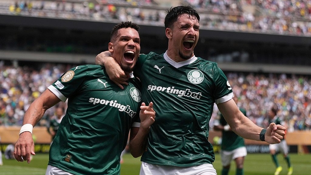 Photo: AP : Palmeiras' Paulinho, left and Joaquin Piquerez celebrate the former's goal during their FIFA Club World Cup round of 16 match against Botafogo in Philadelphia.