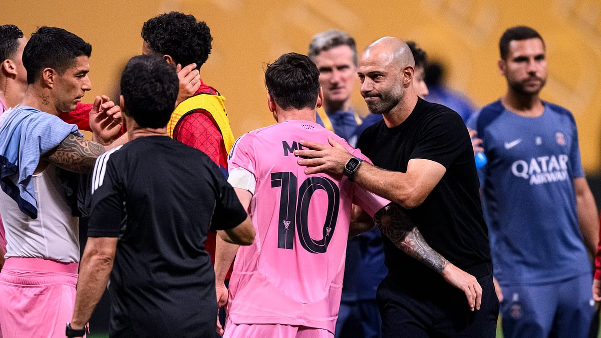 Lionel Messi and Javier Mascherano after Miami's loss to PSG