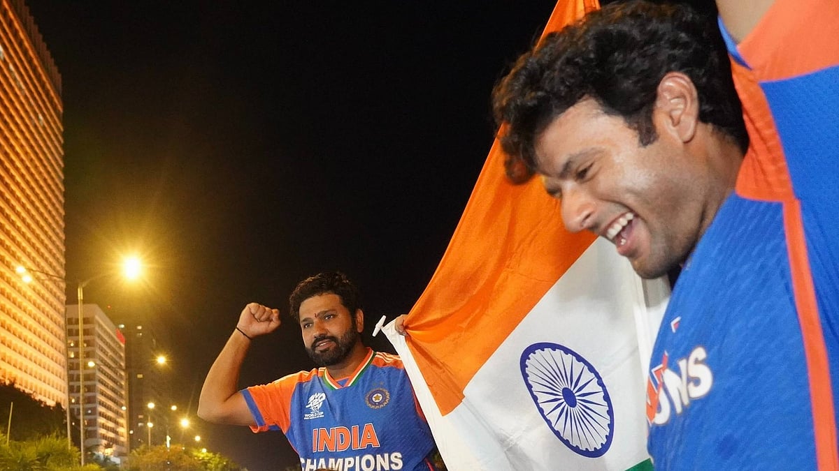 Photo: X | Rohit Sharma : India cricketer Rohit Sharma with his teammate Shivam Dube after winning the ICC Men's T20 World Cup 2024.