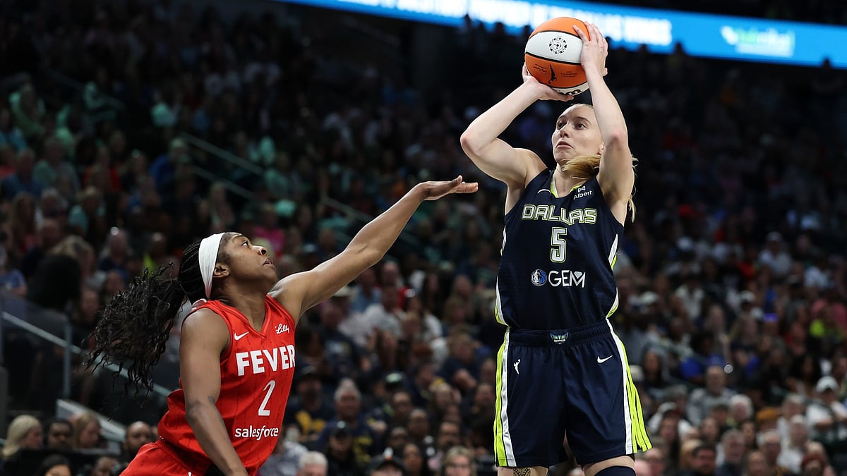 Paige Bueckers #5 of the Dallas Wings shoots over Aari McDonald #2 of the Indiana Fever during a game at American Airlines Center on June 27, 2025 in Dallas, Texas.