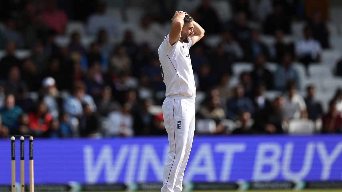 Englands Chris Woakes reacts after bowling a delivery on day four. AP