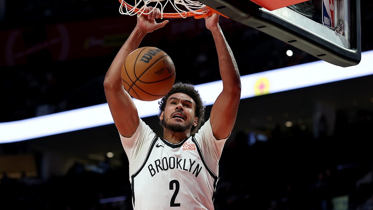 Brooklyn Nets forward Cameron Johnson scores on a dunk vs. the Portland Trail Blazers on Jan. 14, 2025.