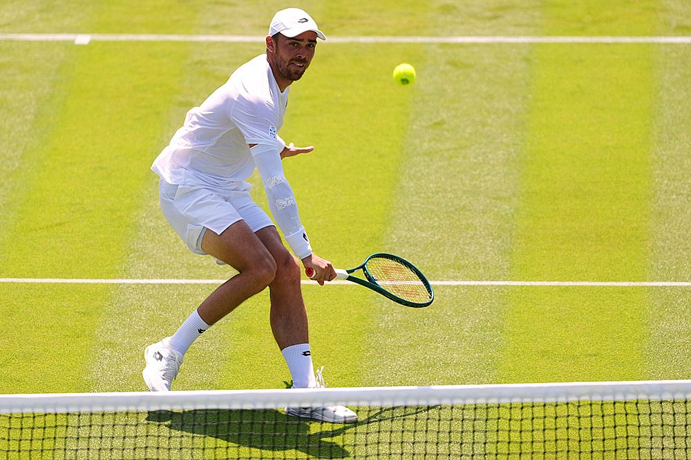 | Photo: AP/Kirsty Wigglesworth : Wimbledon Tennis: Benjamin Bonzi vs Daniil Medvedev