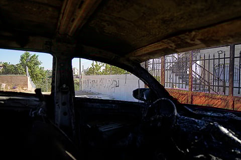 Israeli settlers burn cars in West Bank attack