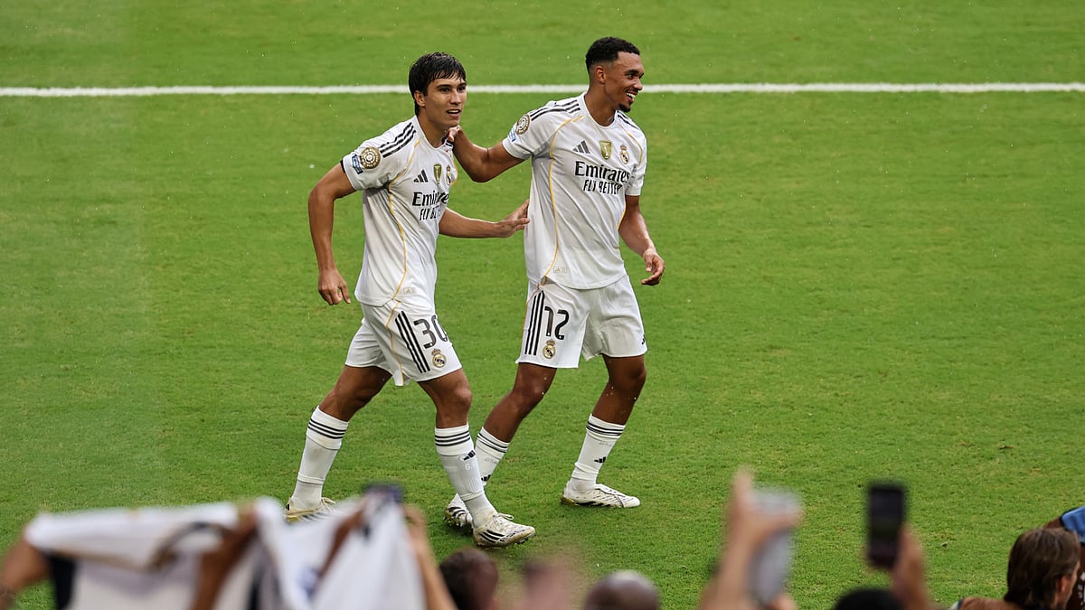 Gonzalo Garcia celebrates with Trent Alexander-Arnold