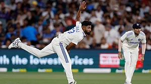 | Photo: AP/James Elsby : Mohammed Siraj in action.