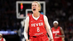 Sophie Cunningham #8 of the Indiana Fever celebrates her three-point basket against the Minnesota Lynx during the fourth quarter of the championship game of the 2025 Commissioners Cup at Target Center on July 1, 2025 in Minneapolis, Minnesota.