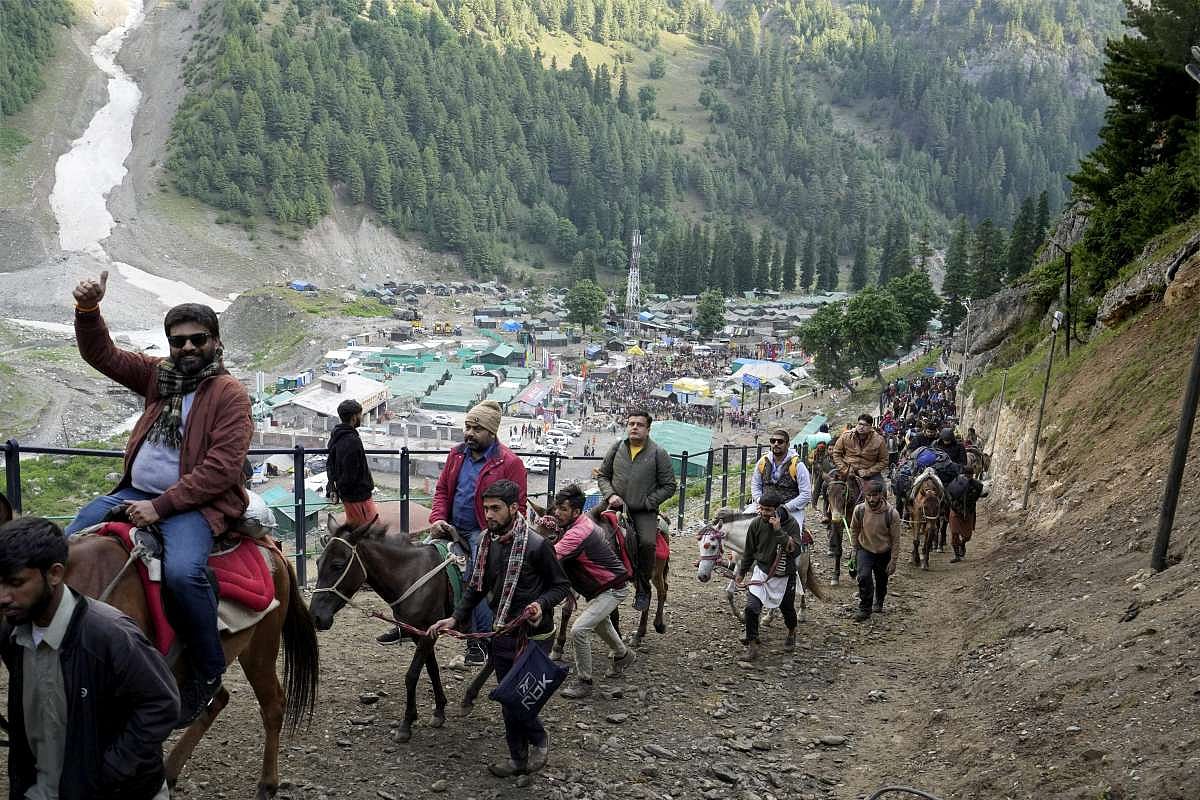 PTI : Pilgrims on their way to the holy cave shrine of Amarnath