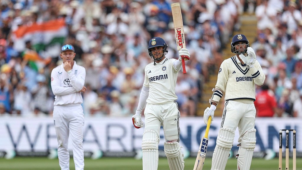 AP : India vs England, 2nd Test Day 2: Shubman Gill raises his bat after scoring 250 runs in Birmingham.
