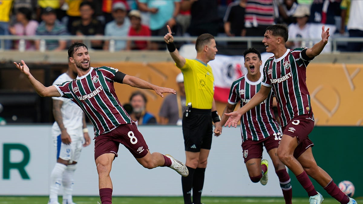 Fluminenses Matheus Martinelli, left, celebrates after scoring. AP