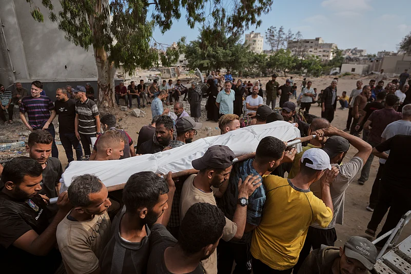 A Palestinian wounded while returning from one of the Gaza distribution centers