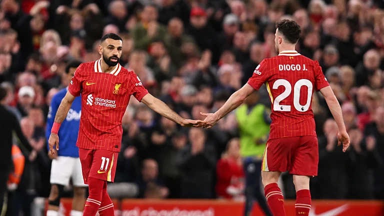 Liverpool's Diogo Jota and Mohamed Salah. - null