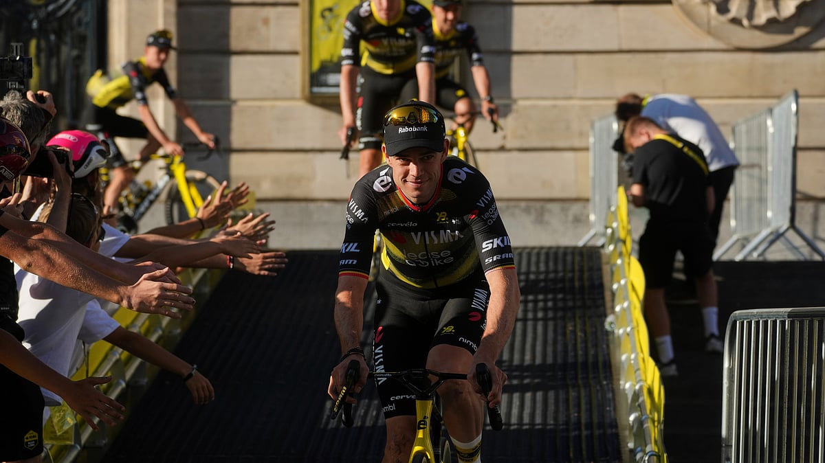 | Photo: AP/Thibault Camus : Tour de France 2025: Belgium's Wout van Aert rides down the ramp during the team presentation two days ahead of the start of the Tour de France Cycling race in Lille, France, Thursday, July 3, 2025.