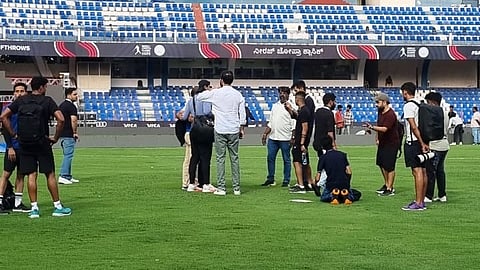 Neeraj Chopra getting pictures clicked with his fans.