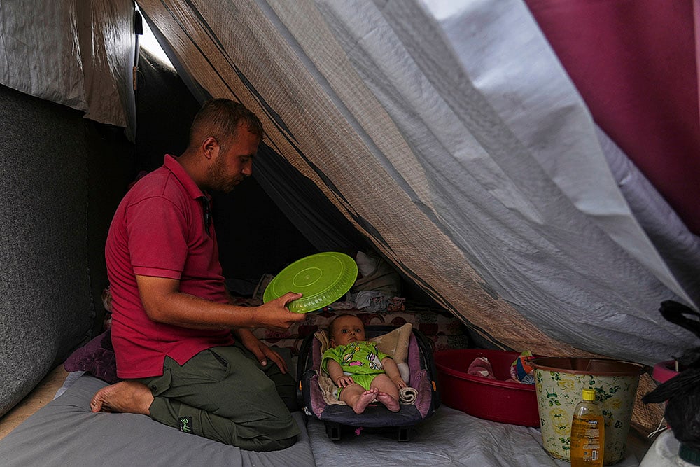 "Gaza heatwave - | Photo: AP/Abdel Kareem Hana