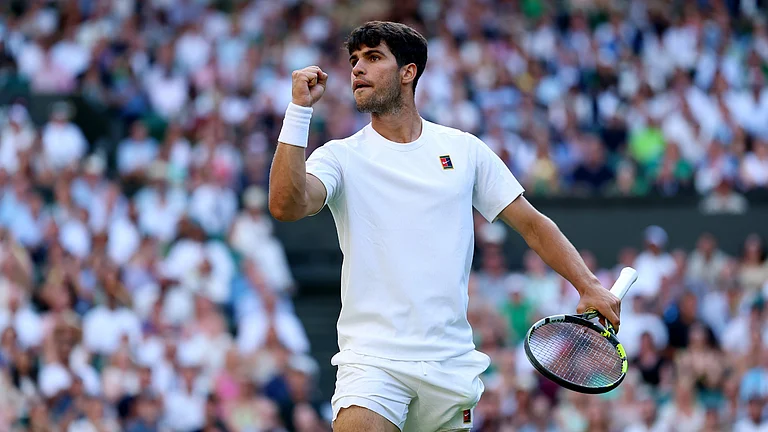 Reigning Wimbledon champion Carlos Alcaraz. - null