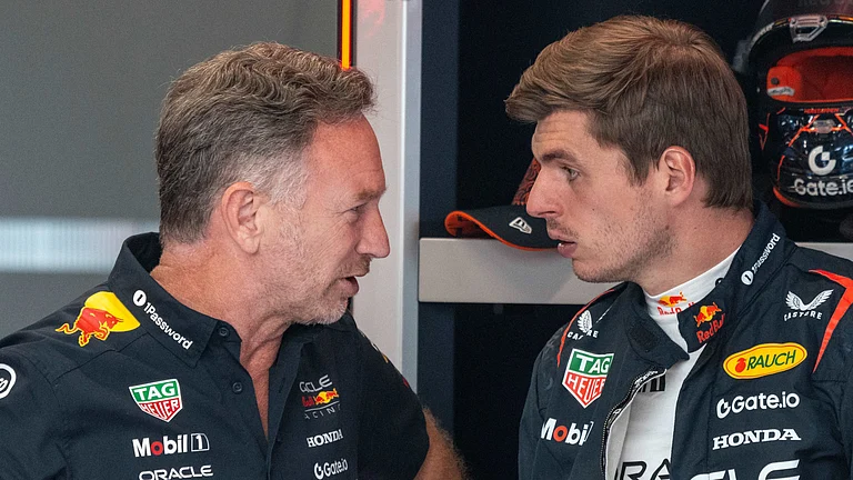 Red Bull team principal Christian Horner and Max Verstappen - null