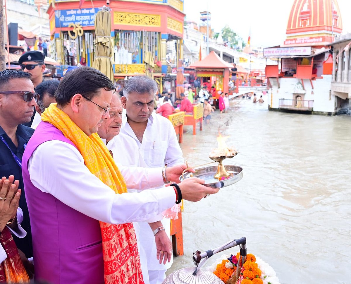 Uttarakhand Chief Minister Pushkar Singh Dhami performing a traditional worship of Mother Ganga at Brahmakund, Har Ki Pauri in Haridwar