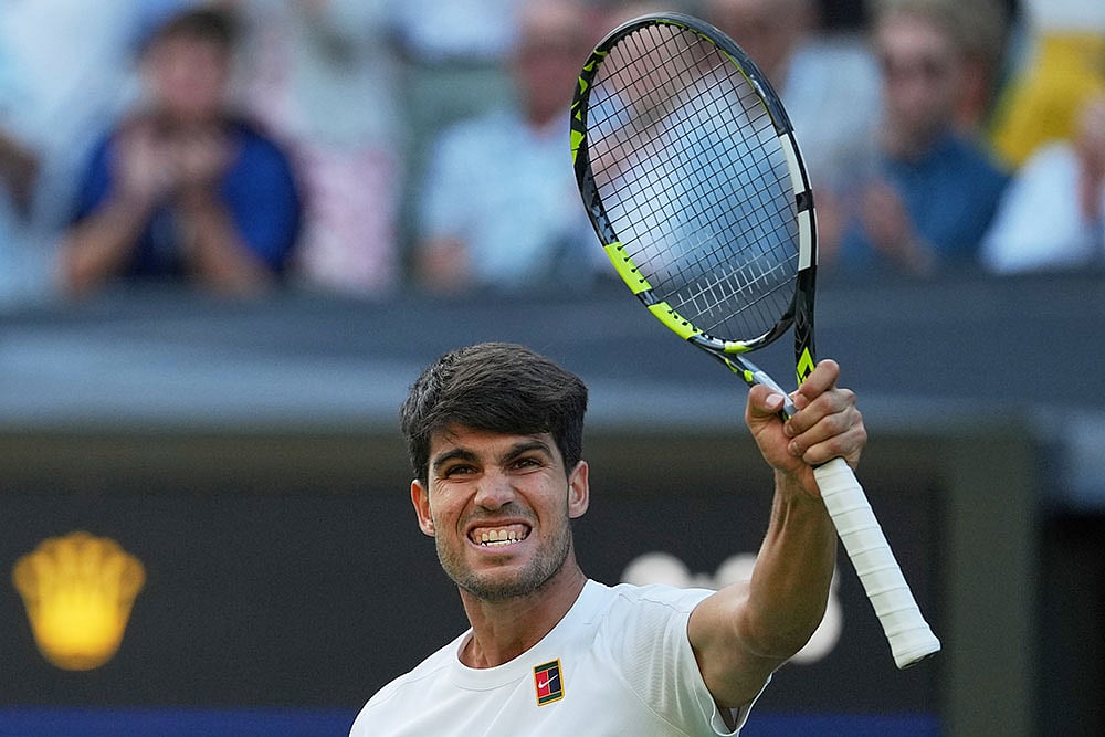 | Photo: AP/Kin Cheung : Wimbledon Tennis: Carlos Alcaraz vs Jan-Lennard Struff