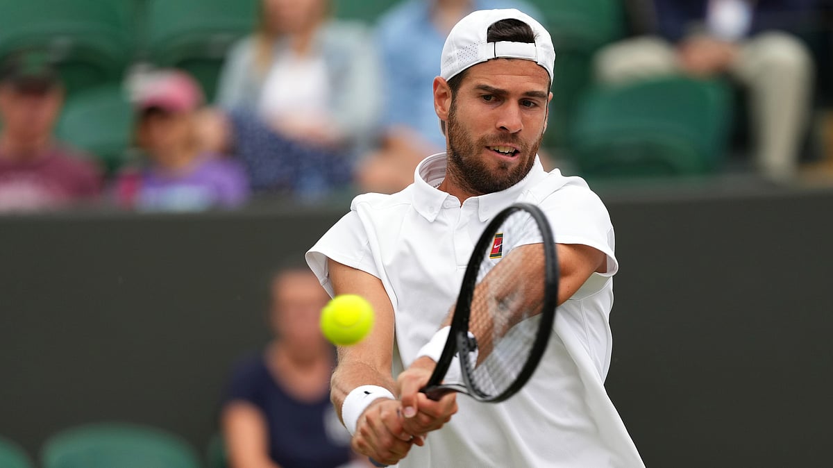 | Photo: AP/Kirsty Wigglesworth : Karen Khachanov Vs Kamil Majchrzak, Wimbledon 2025: Karen Khachanov of Russia plays a return to Kamil Majchrzak of Poland during their men's singles fourth round match at the Wimbledon Tennis Championships in London, Sunday, July 6, 2025.