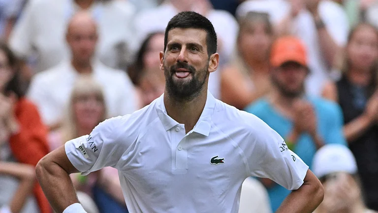 Novak Djokovic celebrates his 100th Wimbledon win. - File