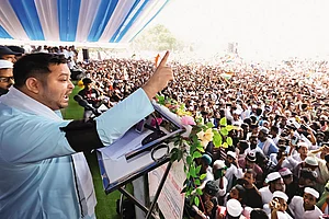 | Photo: PTI : Poll Pitch: RJD leader Tejashwi Yadav speaks during the ‘Waqf Bachao Samvidhan Bachao’ conference in Patna
