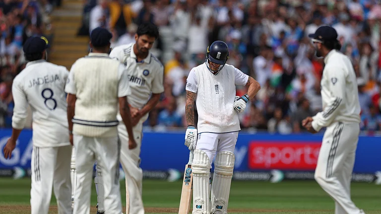 England captain Ben Stokes, second right, reacts after losing his wicket on day five of the second cricket test match between England and India at Edgbaston in Birmingham. - AP Photo/Scott Heppell