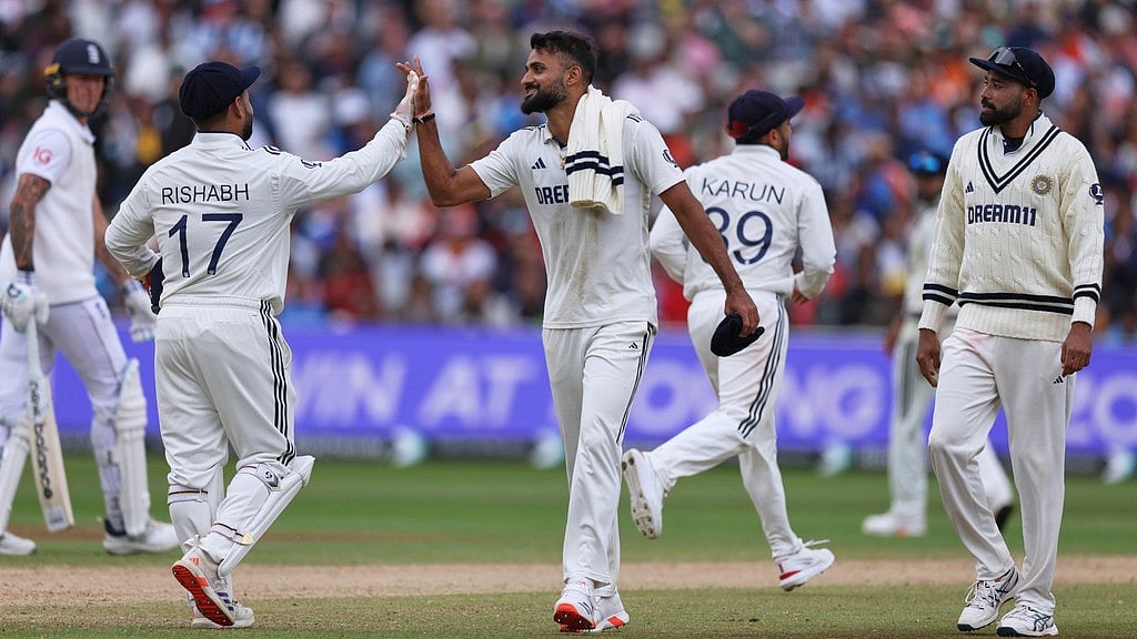 Photo: AP : IND Vs ENG Highlights, 2nd Test Day 5: Akash Deep, centre, celebrates after his five-wicket haul at Edgbaston.