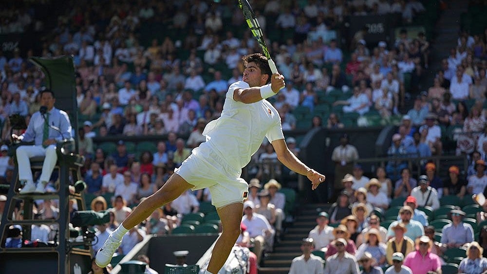 | Photo: AP/Alastair Grant : Wimbledon 2025: Carlos Alcaraz in action at SW19. 