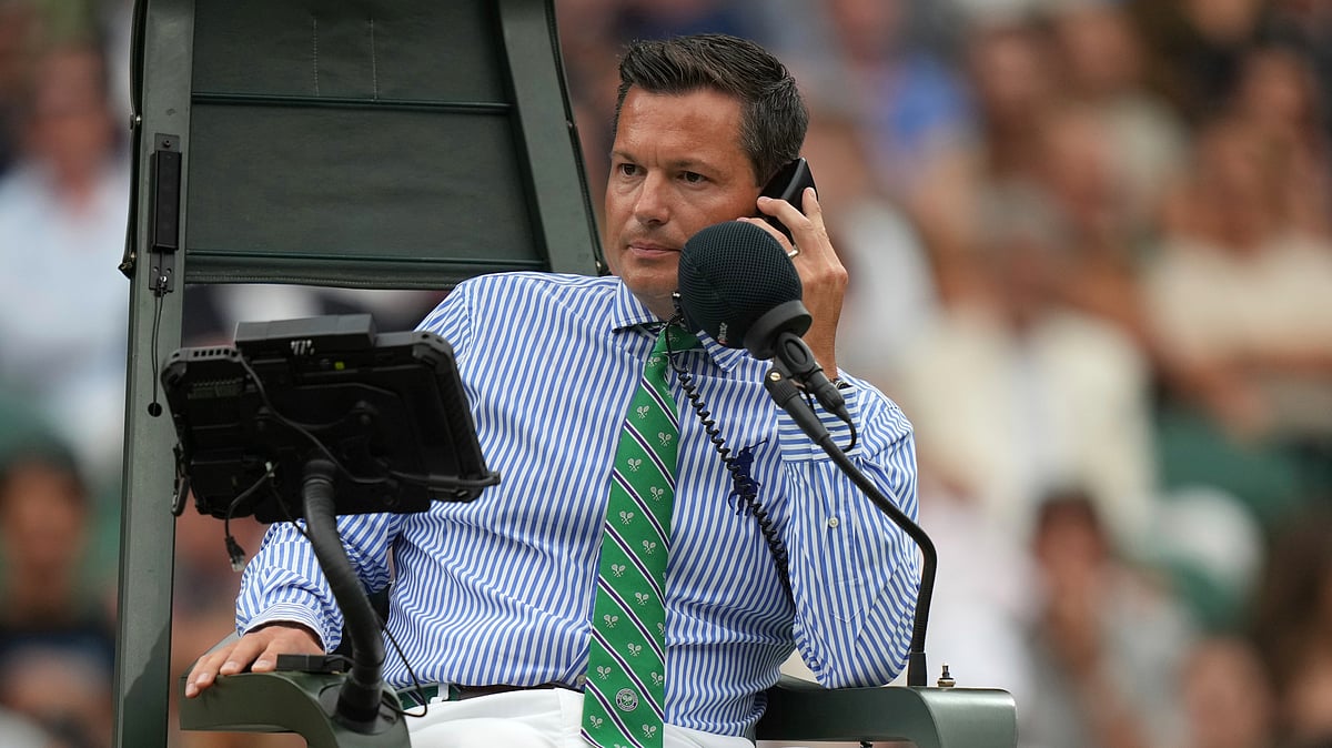Umpire Nico Helwerth checks on a line call as Russia's Anastasia Pavlyuchenkova plays Sonay Kartal of Britain during a fourth round women's singles match at the Wimbledon Tennis Championships in London, Sunday, July 6, 2025. -  (AP Photo/Alastair Grant)