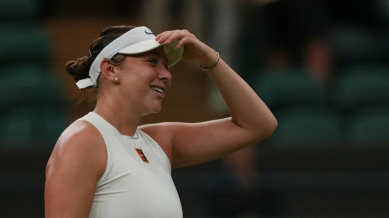 Amanda Anisimova of the U.S. celebrates winning her womens singles. AP