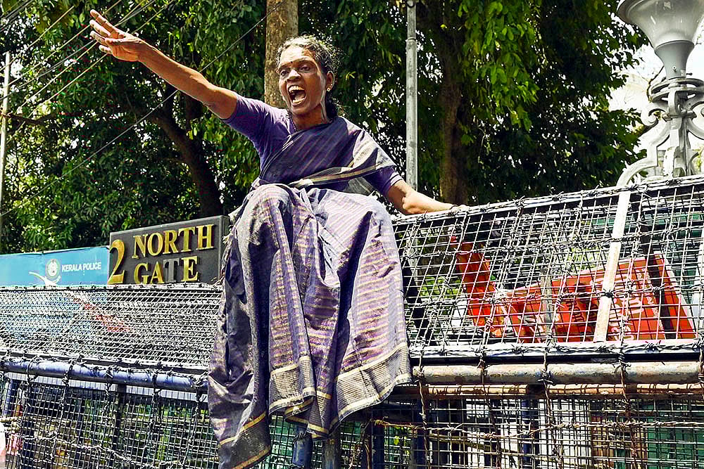 | Photo: PTI : Protest against Kerala Health Minister