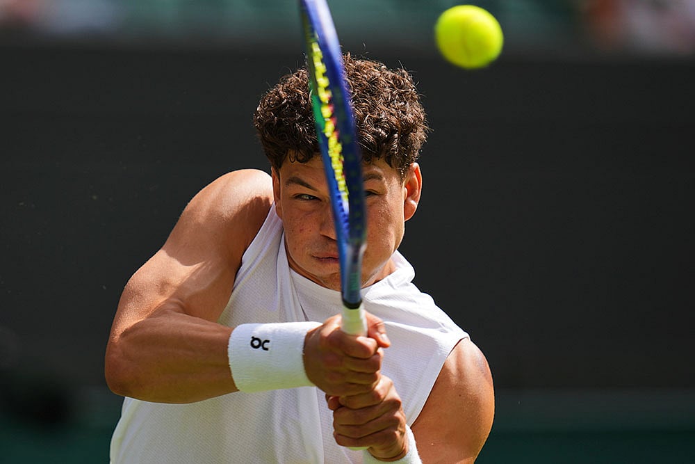 | Photo: AP/Kirsty Wigglesworth : Wimbledon Tennis Ben Shelton