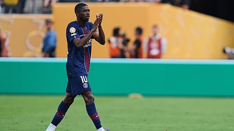 Paris Saint-Germain's Ousmane Dembele applauds fans as he comes out during the Club World Cup semifinal soccer match between PSG and Real Madrid in East Rutherford, N.J., Wednesday, July 9, 2025.