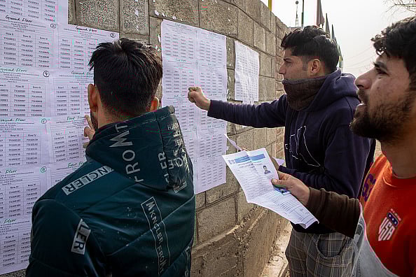 Candidates for police constable posts desperately check their roll in Srinagar  - Photo by Faisal Bashir/SOPA Images/LightRocket via Getty Images