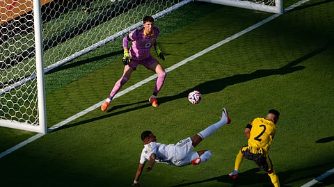 Real Madrid's Kylian Mbappe scores his side's 3rd goal during the Club World Cup quarterfinal soccer match between Real Madrid and Borussia Dortmund in East Rutherford, N.J., Saturday, July 5, 2025.