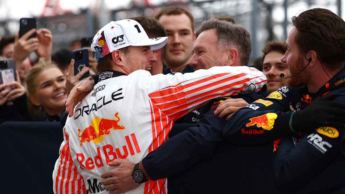 Max Verstappen and Christian Horner after Red Bull's win.