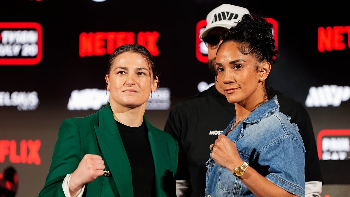 AP Photo/Sam Hodde : Katie Taylor, left, and Amanda Serrano pose for photos during a news conference promoting their upcoming boxing bout, May 16, 2024, in Arlington, Texas.
